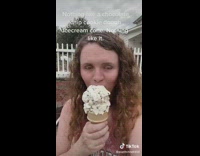 Girl gets chocolate chip ice cream cone