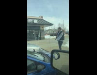 black vest blue car girl dances alone 