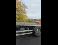 Small toy truck on the truck cargo