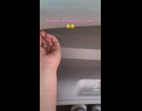 Lady shows how to remove cabin air filter 