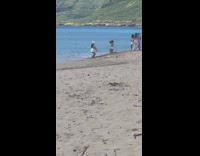 Five women white dress beach photo shoot