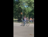 Guy yells near park and bikers 