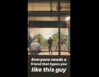 Man hypes up dancer inside of subway station