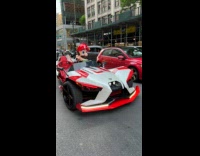 Collab WINY - Super Mario drive slingshot car street nyc okay sign beside red car