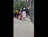 Collab WINY - Man wearing end of world signage