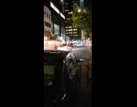 Michael myers in backseat of colorful car 