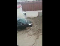 Harsh flood streaming down the street germany