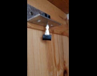 Man hangs closet key using magnets