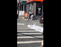 Crazy tattooed man outside dunkin store talks