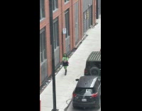 Collab IITW - Woman green skin video shoot on sidewalk