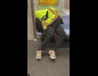 Yellow jacket lady sleeping on subway snores 