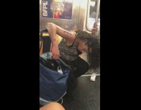 Woman falls asleep on subway and slouches her head