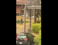 Woman both arms up black banner 