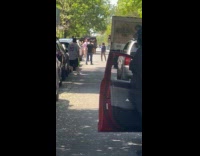 Woman shouts at truck blocking the road