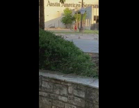 Woman red leggings dance Austin American-Statesman sunset
The video is far away
