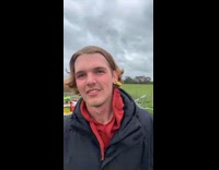 Guy gets ear pierced by animal tag gun