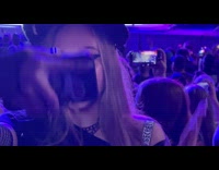Woman selfie video at concert in front