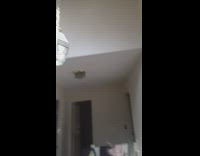 Skylight Casts Shapes on Wall during Day 