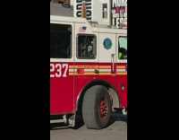 Zombie doll inside honking fire truck