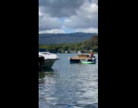 Couple tiktok dance on boat with platform