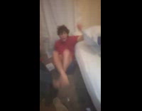 Guy recording hits guy in red short in pelvis balls