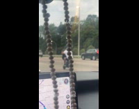 Collab WINY - Man driving electric scooter on highway