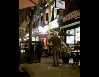 Guy carries large skeleton wearing face mask 