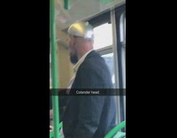 Guy subway silver pot on head colander head