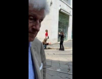 Collab IITW - Lady in Fur Coat Sits on Sidewalk for Pictures