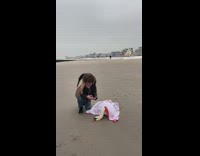 Lady takes care of injured white swan 