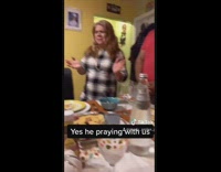 Dog has its own seat and plate for thanksgiving 