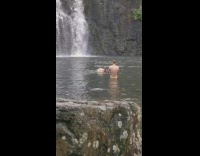 Woman black bikini dip hair flip waterfalls Part 1