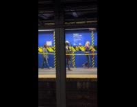 Man medieval armor hold sword at subway