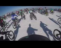 DO NOT USE - BMX bikers race down icy snow mountain, one biker falls and causes big collision