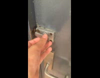 Filmer in bathroom with wrong door lock