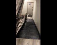 Filmer climb down apartment stairs shows rain leak
