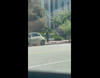 Woman black top slow match street car