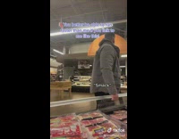 Guy passes woman sausage 