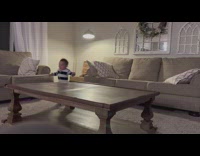 Baby striped pajamas run around the table