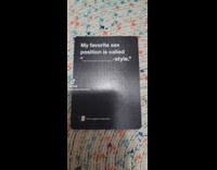 Woman laughs at Cards Against Humanity game 