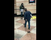 Man Carries Pizza Box in an Untraditional Way 