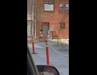 Pink jacket skirt girl yellow caution tape 