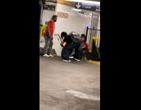 2 guys push motorcycle upstairs 