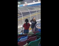 Black shirt girl car racetrack event 