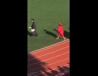 Girl falls down at high school graduation