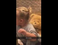 Win a baby inside of claw machine