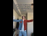 Guy Hand on head in room white shirt 