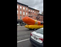Oscar Mayer Wienermobile drives around the city