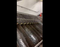 Rainwater flowing down subway stairs
