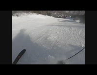 KaleSaladIG - Skier blue jacket trips on skis and slides down slope